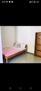 Cama o camas de una habitación en Mr.kwiiz inn