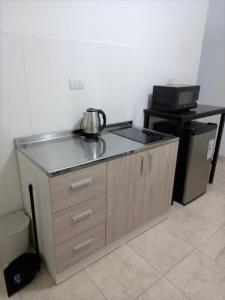 Una cocina o kitchenette en Moderno Apartamento Mendoza Céntrico