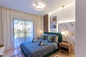 a bedroom with a bed with two rubber ducks on it at Cozy Golf Apartment Wifi 4k-TV Netflix in Marrakech +12 photos