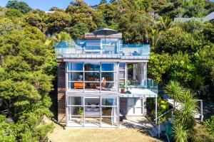 an aerial view of a house with a lot of glass at Bellevue in Onetangi