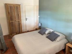 Letto o letti in una camera di Villa du Clapotage