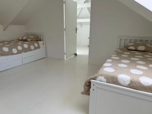 Letto o letti in una camera di Villa du Clapotage