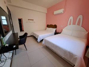 Ліжко або ліжка в номері Have FUN villa