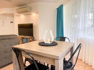 TV a/nebo společenská místnost v ubytování Trinity Links Resort