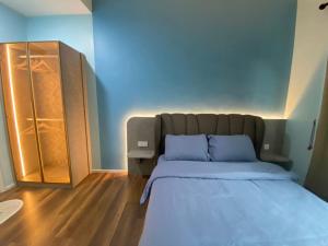 Кровать или кровати в номере Hotspring 1801 2 Room Suite @ Sunway Onsen, Neighbour of Lost World of Tambun- 8 pax