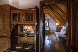 Posezení v ubytování Tagyon Birtok Royal Apartmanház