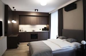 Posteľ alebo postele v izbe v ubytovaní Apartamenty Legionów- A12 stylowy apartament w świetnej lokalizacji