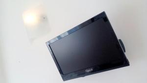a flat screen tv hanging on a wall at Alloggio Cavour in Ferrara