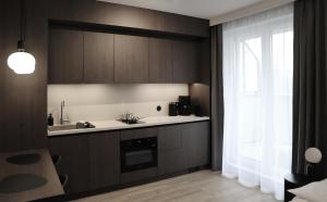 Kuchyňa alebo kuchynka v ubytovaní Apartamenty Legionów- A12 stylowy apartament w świetnej lokalizacji