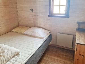 Postel nebo postele na pokoji v ubytování 6 person holiday home in Nordli-By Traum
