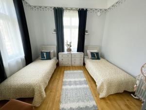 Voodi või voodid majutusasutuse Spacious Supeluse Apartment toas