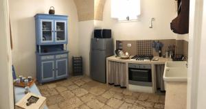 Kuchyň nebo kuchyňský kout v ubytování Antica Casa del Pozzo + 17 fotografií