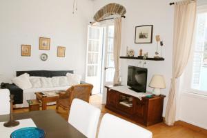 Televízia a/alebo spoločenská miestnosť v ubytovaní Magdalene's house + 1 fotografia