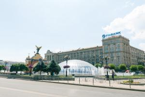 a large building with a fountain in front of it at Khreschatyk. Maidan, Independence Square 2BR in Kyiv