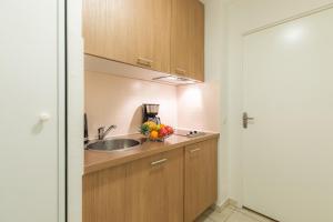 Kjøkken eller kjøkkenkrok på Appart'City Confort Toulouse Purpan