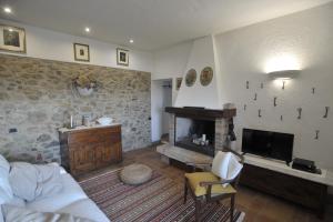 TV a/nebo společenská místnost v ubytování Villa San Regolino whit private pool