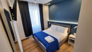 Postel nebo postele na pokoji v ubytování Atlantis Home