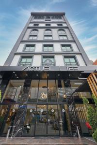 a building with a sign on the front of it at ACTUEL LİFE HOTEL in Istanbul