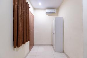 Fotografie z fotogalerie ubytování RedDoorz @ Medan Johor 2 v destinaci Delitua