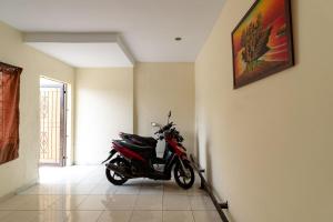 Fotografie z fotogalerie ubytování RedDoorz @ Medan Johor 2 v destinaci Delitua
