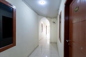 Fotografie z fotogalerie ubytování RedDoorz @ Medan Johor 2 v destinaci Delitua