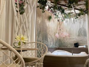 A bed or beds in a room at Suite Dreams Montecatini