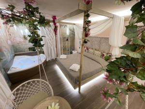 A bed or beds in a room at Suite Dreams Montecatini