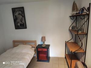 Postel nebo postele na pokoji v ubytování AUX 2 LACS Gîte