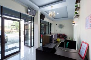 Μια τηλεόραση ή/και κέντρο ψυχαγωγίας στο RedDoorz @ Simpang Pemda Medan
