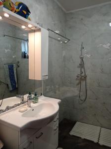 Kúpeľňa v ubytovaní Frangipani