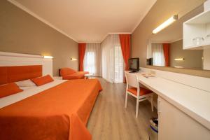 Postel nebo postele na pokoji v ubytování Sueno Hotels Beach Side + 37 fotografií