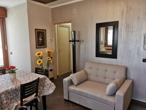 A seating area at NSM Casa di Fulmine attico con box privato