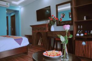 Postel nebo postele na pokoji v ubytování Sapa Hills Hotel