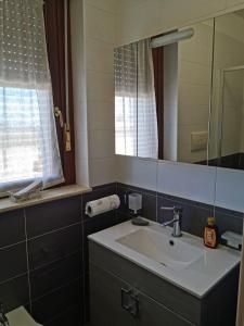 A bathroom at NSM Casa di Fulmine attico con box privato Még 37 kép