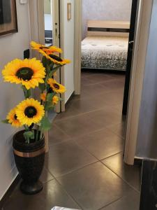 A bed or beds in a room at NSM Casa di Fulmine attico con box privato