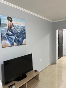 TV i/ili multimedijalni sistem u objektu Hacienda Beach complex- Nicoleta apartment