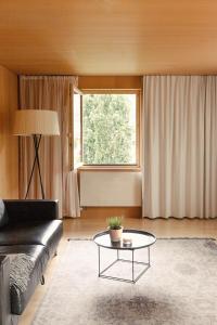 A seating area at Hotel Post Bezau
