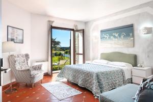 Кровать или кровати в номере Hotel Stefania Boutique Hotel by the Beach