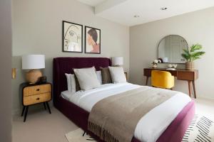 Ένα ή περισσότερα κρεβάτια σε δωμάτιο στο The City of London Secret - Classy 1BDR Flat