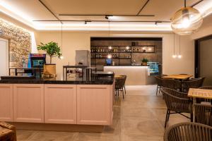 The lounge or bar area at Relais Limonaia - Suites & Garden SPA
