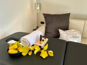 Postel nebo postele na pokoji v ubytování Relais Limonaia - Suites & Garden SPA