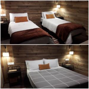 2 camas en una habitación con paredes de madera en El Pajar de Ciguñuela, en Valladolid