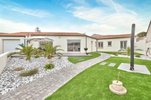 Vonkajšia záhrada v ubytovaní À 250m de la plage - Belle maison pour 6