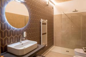 Koupelna v ubytování Relais Limonaia - Suites & Garden SPA