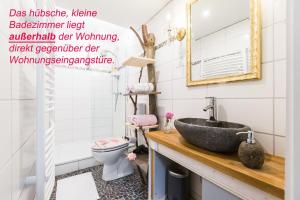 Ένα μπάνιο στο Gemütliche Fachwerkwohnung +45 φωτογραφίες