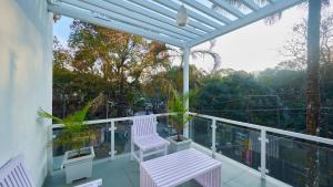 Φωτογραφία από το άλμπουμ του The Elms Thekkady σε Thekkady