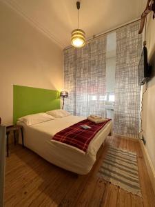 Łóżko lub łóżka w pokoju w obiekcie ChatNoirPorto LaMaison