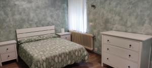 Postel nebo postele na pokoji v ubytování HOSTEL LA CABAÑUELA