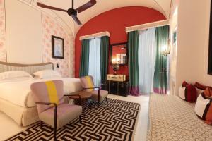 Ліжко або ліжка в номері Capri Tiberio Palace - The Leading Hotels of the World