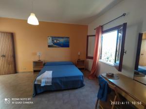 Posteľ alebo postele v izbe v ubytovaní Testa di Monaco - Basic Beach Accommodations